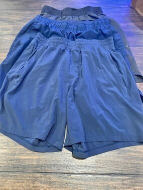 3 pairs of Men’s athletic shorts (Lululemon, Nike, Adidas). Small